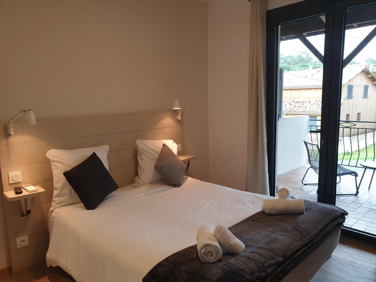 Hotel Cote Et Lac Biscarrosse Bagian luar foto